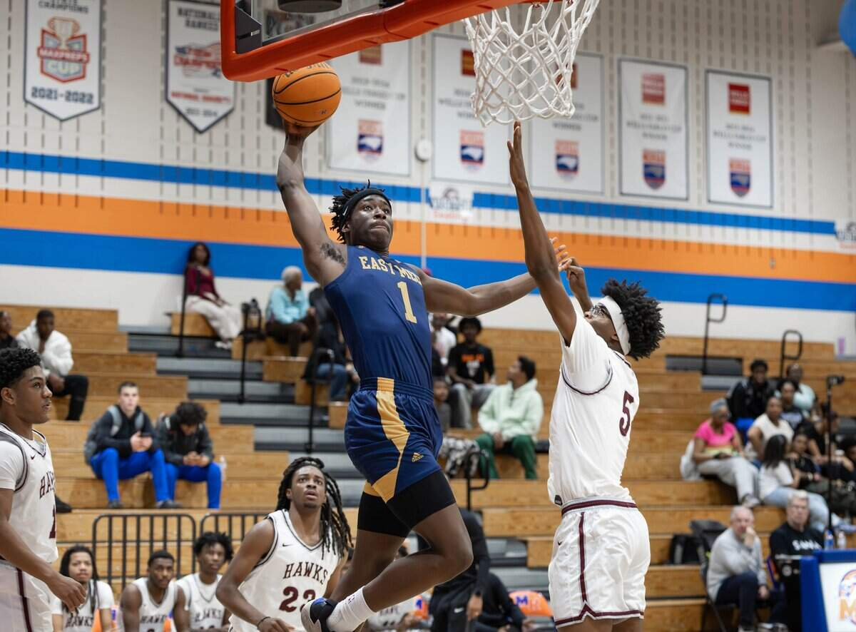 High school player rising for a dunk at last year's Mike Gminski Classic