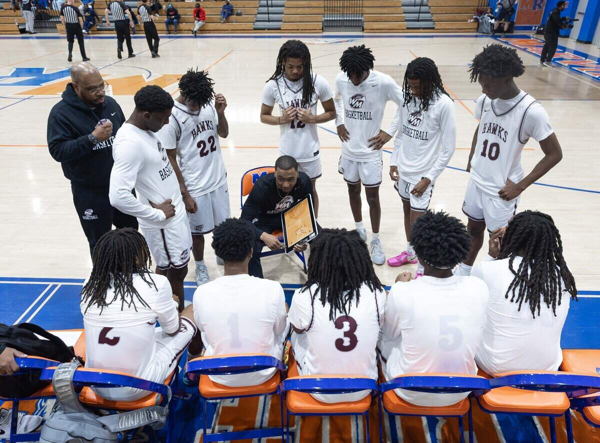 Team huddle during last year's Mike Gminski Classic